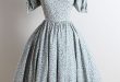 ➳ vintage 1950s dress * blue, gray floral cotton * bow sleeve .