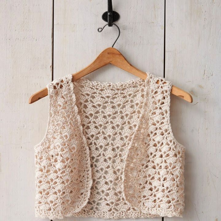 A
Crochet Vest Accentuating Your Ordinary Outfits With