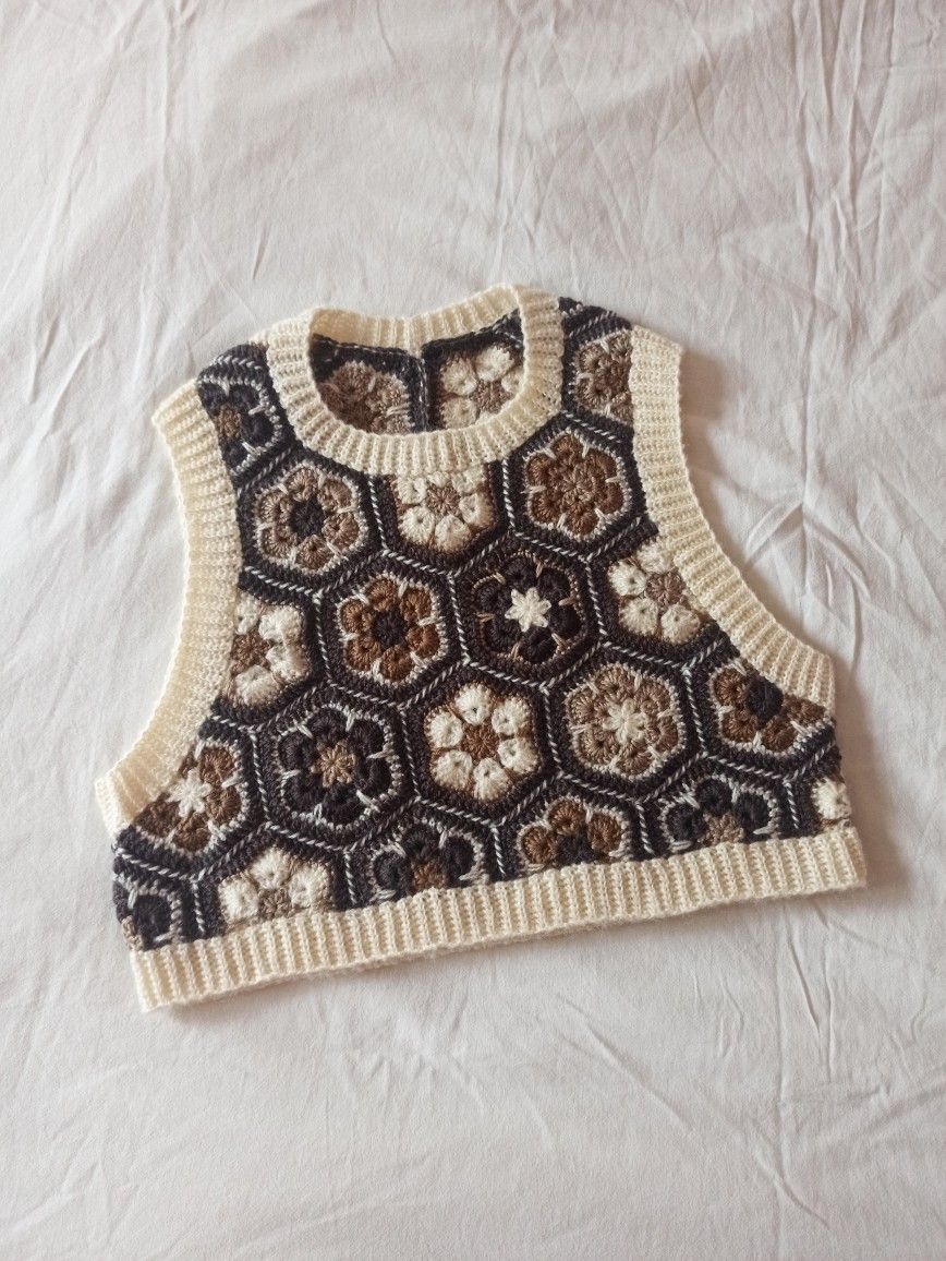A
Crochet Vest Accentuating Your Ordinary Outfits With