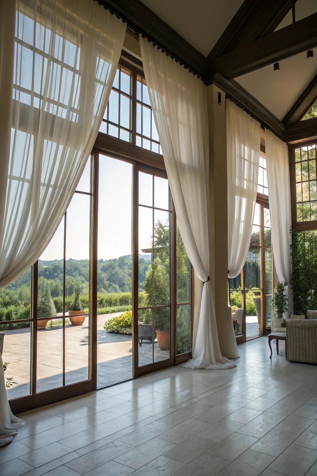 Ethereal drapes create a smooth indoor-outdoor flow.