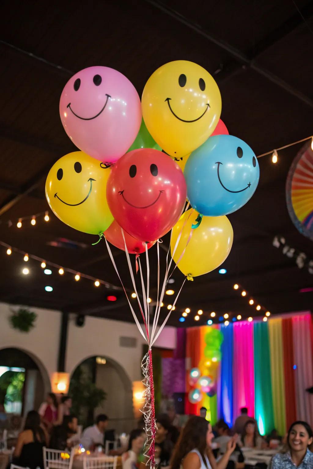 Cheerful icon-themed balloons brighten the party space.