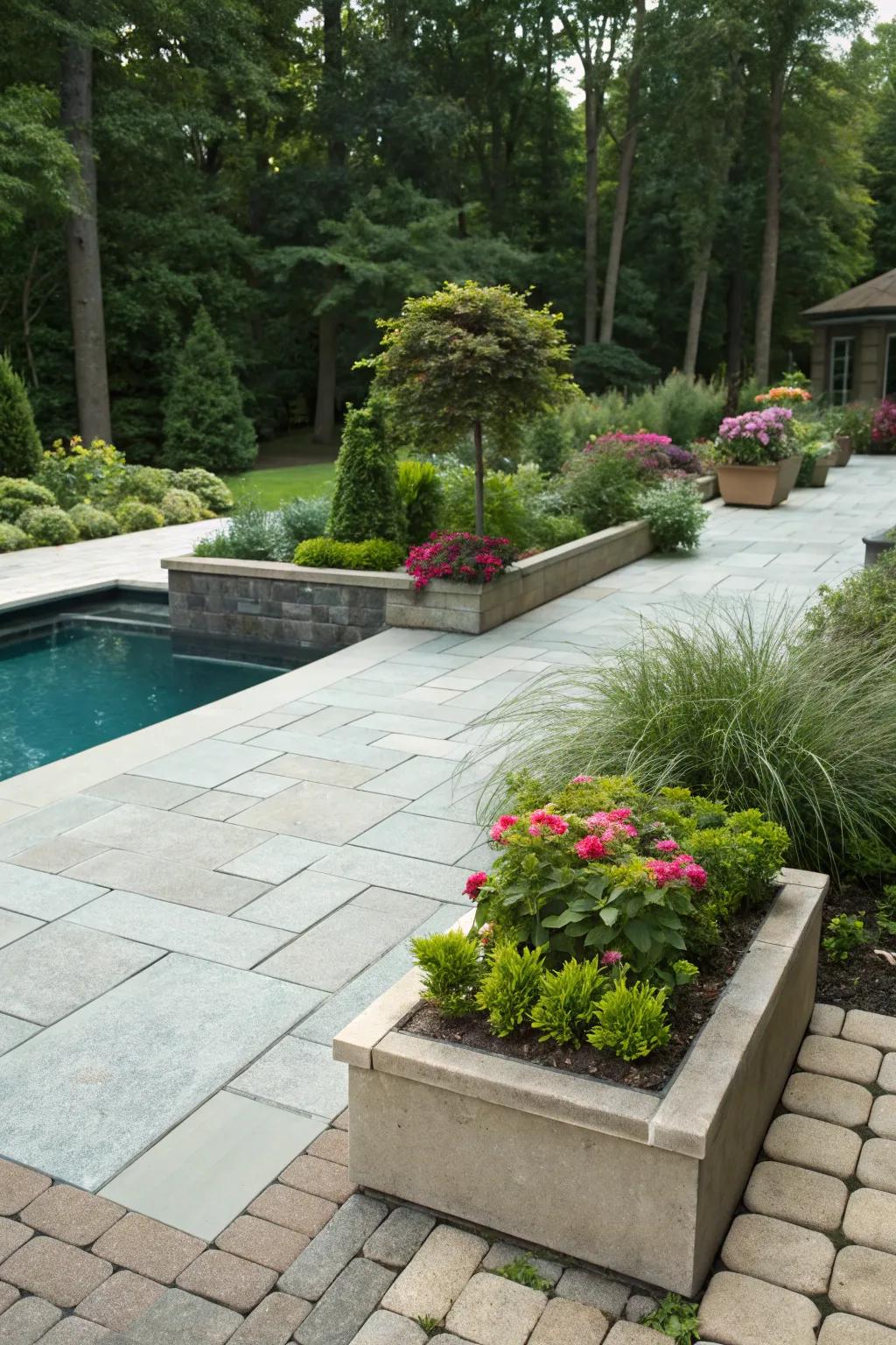 Greenery intermixed with tiles offers a seamless transition to the garden.