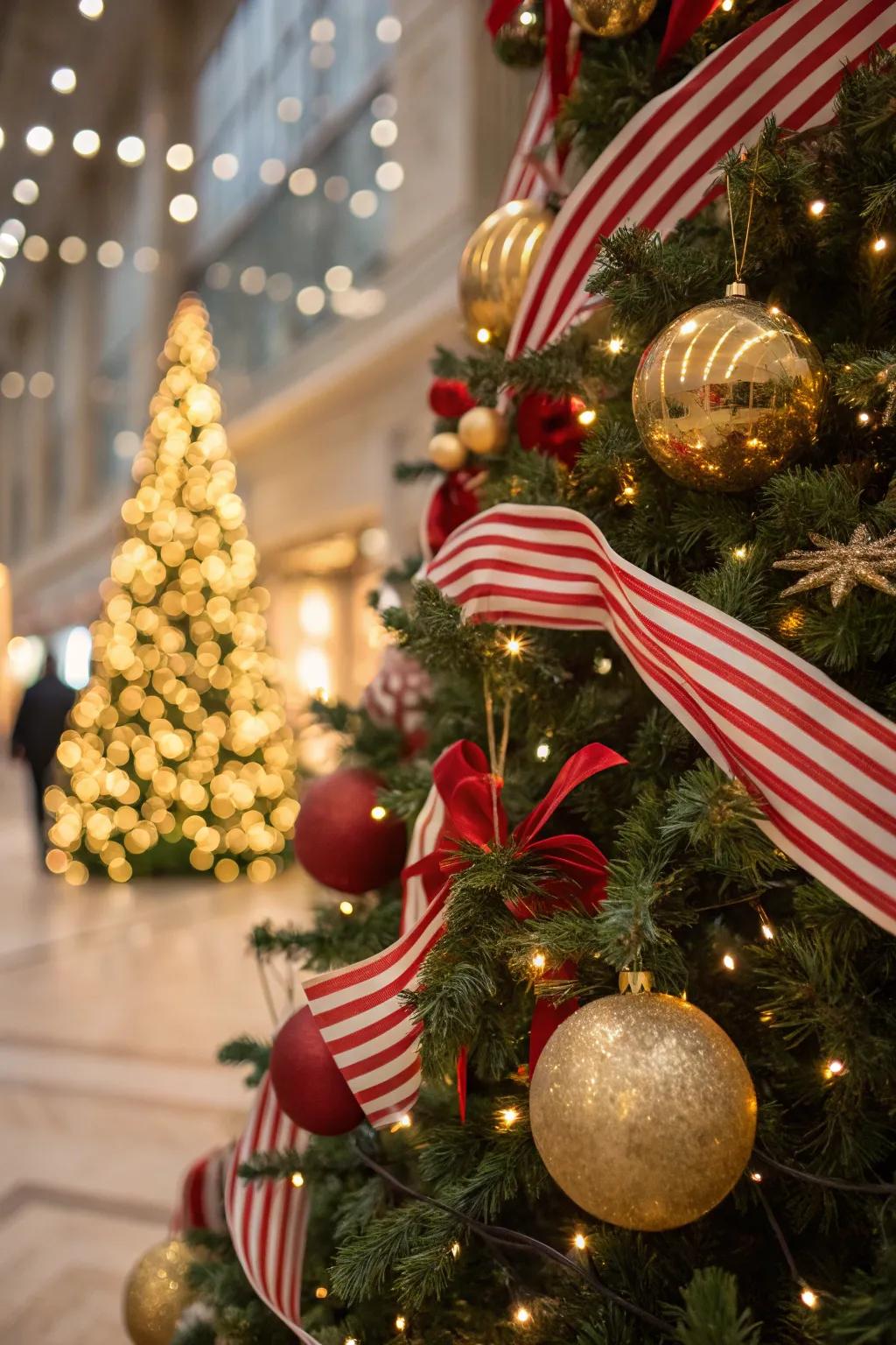 Playful ribbons introduce a whimsical element to a crimson, pristine, and gilded tree.