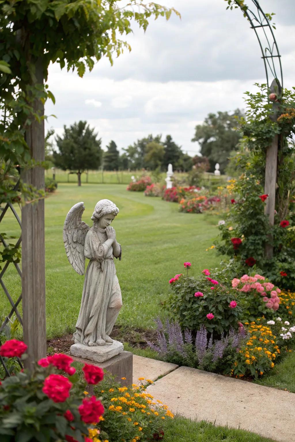 A serene angel sculpture adds a soothing presence to the memorial garden.