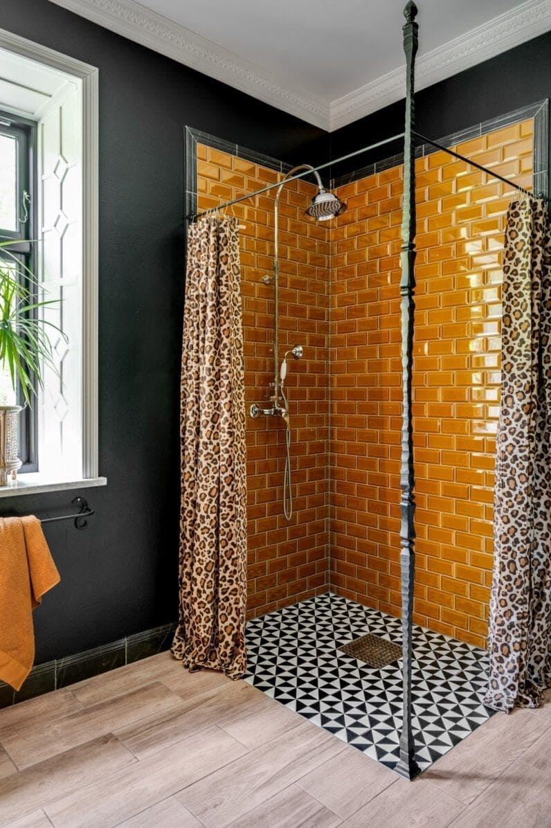 Bold Amber Subway Tile Shower