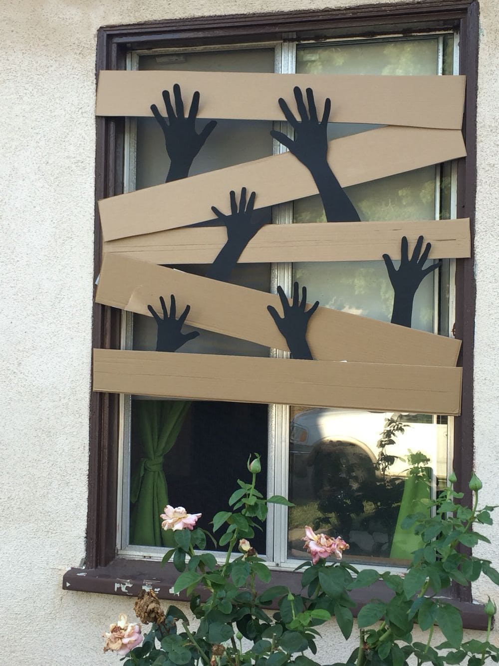 Zombie Hands Bursting Through Window