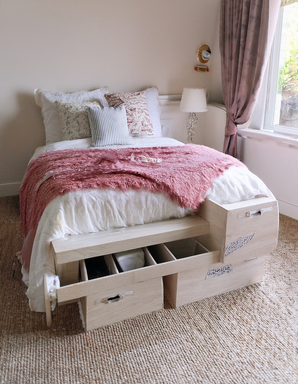 Under-bed storage in coastal bedroom